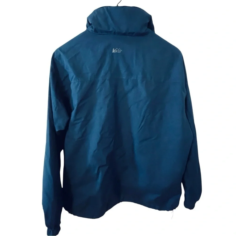 REI Men’s jacket size medium midnight, blue hidden hood